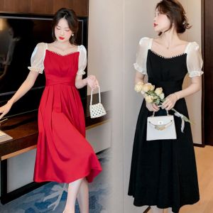 ชุดเดรสยาวทรงเอเอวสูงสีเขียวมะพร้าวสไตล์นุ่มๆ สำหรับผู้หญิงในช่วงฤดูร้อนปี 2025 ดีไซน์ใหม่ สัมผัสหรูหรา กระโปรงยาว