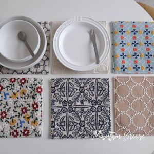 ที่รองรับเสื้อผ้าม้าลายปักแบบป้องกันความร้อนสำหรับโต๊ะทานอาหารสไตล์ฝรั่งเศสและจีน ที่รองแก้วชา ที่รองหม้อ ผ้าฝ้ายลินินปักลายสไตล์ย้อนยุค