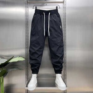 กางเกงกีฬาชาย ทรงหลวม ระบายอากาศได้ดี กางเกงขายาวทรงสลิมฟิต ทรงฮาราจูกุ แฟชั่นฤดูใบไม้ผลิและฤดูใบไม้ร่วง