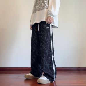 Quần nhung cho nam phong cách mùa xuân và mùa hè thương hiệu cao thời trang đường phố Mỹ kích thước lớn ống thẳng thể thao quần sọc nam