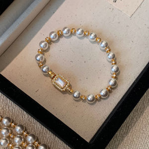 CAFFTI | Natural Mother of Pearl Button Grey Freshwater Pearl Luxurious Bracelet