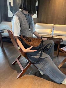 High-End Leather Shoulder Crossbody Bag for Women 2025 New Style Dumpling Shape Saddle Bag Versatile Soft Handle Zipper Closure