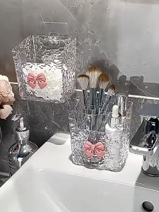 Hộp Đựng Đồ Trang Điểm Dán Tường Chất Liệu Nhựa Trong Suốt Giá Treo Tường Mini Không Cần Khoan Kèm Charm Nơ Xinh Xắn