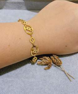 Gelang Plat Motif Titan Wanita