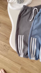 Quần dài quần nỉ da cá phong cách thể thao phối dây cho bé trai bé gái 9 tới 28kg BERNIE H0725Q84