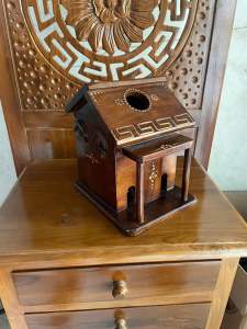 Rumah kayu tempat tisu