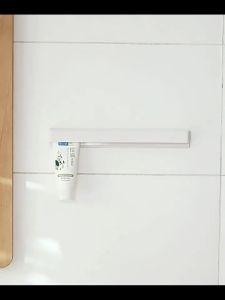 1/2pcs Wall Mount Toothpaste Holder Bathroom Toothpaste Storage Rack No Drill Space-Saving Toothpaste Holder