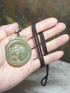 Premium Nephrite light greenish with some caramel brownish dots hollowed out & double-side carved Elephant Jade pendant (with certificate)和田玉且末青白带小许糖沁镂空双面雕刻大象吊坠(带证书)