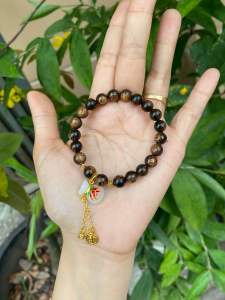 Vòng tay trầm hương sánh mix charm túi tiền