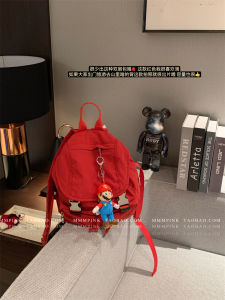 กระเป๋าเป้สะพายหลังผ้าสีแดงความจุขนาดใหญ่สำหรับนักเรียน กระเป๋าปีนเขาแบบลำลอง กระเป๋าสะพายไหล่คู่ วัสดุไนลอน ซิปปิด