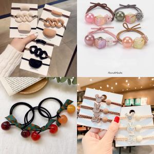 หัวข้อ: ยางมัดผม ยางรัดผมลายหมีน้อย กระต่ายและมิกกี้เม้าส์ แฟชั่นน่ารัก สีขาวและสีน้ำตาล