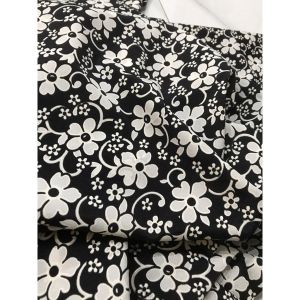 vải voan hoa trắng nền màu đen mềm dày vừa giá  1m_( khổ  1m5)may đầm váy áo dài thời trang