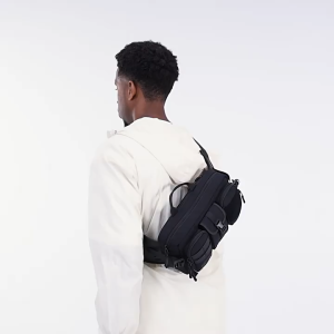 OZUKO tactical waist bag with multiple compartments and adjustable strap