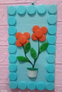 Kerajinan/Hiyasan dinding dari tutup botol.