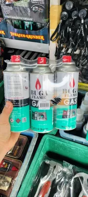 แก๊สจุดไฟ ขนาดใหญ่และเล็ก บรรจุในกระป๋องสีขาวและเขียว