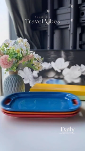 Le Creuset French stoneware underglaze colored rectangular flat plate with double handles oven enamel glaze durable safe  durable stoneware with a smooth sand-quartz interior enamel. Oven- microwave- freezer- and dishwasher-safe