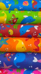 ผ้าเมตร ผ้าลายการ์ตูน ผ้าโพลีเยสเตอร์ ลายสัตว์ทะเล เนื้อบาง ราคาถูก หน้ากว้าง 45 นิ้ว หน่วยขายต่อเมตร