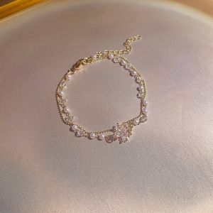 Trendy Titanium Steel Double Layer Pearl Bracelet Womens Extra Sparkling Exquisite Zircon Flower Pendant Hand Bracelet New Model Hand Jewelry