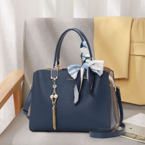 Aidrani Elegant and minimalist womens handbag made of high-quality first layer cowhide with metal tassels and ribbons