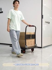 Collapsible four-wheeled trolley pallet truck hauling cart