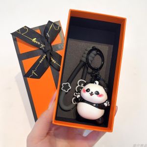ลูกปัดพีชไม้แพนด้าสะท้อนแสงพร้อมกล่องของขวัญพร้อมหัวเข็มขัดรถยนต์ ห้อยกระเป๋า โลหะผสม พิมพ์ลายหมีแพนด้า