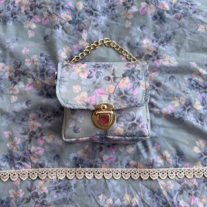 Mukena trafelling parasut renda kecil/mukenah trafelling mini pouch