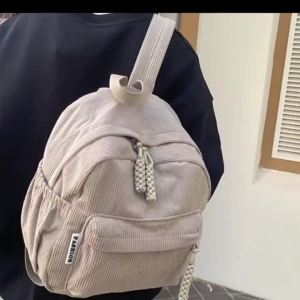 Elegant Casual Daypack Solid Nylon Backpack with Adjustable Shoulder Strap and Pom-Pom Charm for Women Daily Use All Occasions