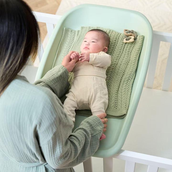 Tutti%20Bambini%20Cushi%20Baby%20Cot%20Top%20Changing%20Mat%20-%20Assorted%20Colours%20-%20Image%204