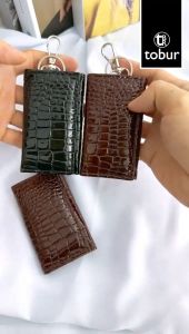 DOMPET KUNCI STNK MOBIL BAHAN SERAT URAT JERUK\\n\\n Apa itu Dompet Kunci STNK Mobil?\\nDompet kunci STNK mobil adalah produk yang dirancang khusus untuk menyimpan kunci mobil dan STNK (Surat Tanda Nomor Kendaraan) Anda dengan aman dan praktis. Dompet kunci STNK mobil memiliki berbagai keunggulan yang membuatnya menjadi pilihan ideal bagi para pengendara mobil.\\n\\n Keunggulan Dompet Kunci STNK Mobil\\nDompet kunci STNK mobil menawarkan berbagai keunggulan yang menjadikannya pilihan ideal bagi para pengendara mobil. Beberapa keunggulan tersebut antara lain:\\n\\n- **Dompet kunci berkualitas tinggi**: Dompet kunci STNK mobil dibuat dari bahan berkualitas tinggi yang tahan lama dan kuat.\\n- **Dompet kunci tahan lama**: Dompet kunci STNK mobil dirancang untuk bertahan lama dan tidak mudah rusak, sehingga Anda bisa menggunakannya dalam jangka waktu yang panjang.\\n- **Dompet kunci mobil praktis**: Dompet kunci STNK mobil memiliki desain yang praktis dan mudah digunakan, sehingga Anda bisa menyimpan kunci dan STNK Anda dengan mudah dan cepat.\\n\\n Cara Memilih Dompet Kunci STNK Mobil Berkualitas Tinggi\\nUntuk memilih dompet kunci STNK mobil berkualitas tinggi, ada beberapa hal yang perlu Anda pertimbangkan. Beberapa hal tersebut antara lain:\\n\\n- **Bahan pembuatan**: Pilih dompet kunci STNK mobil yang terbuat dari bahan berkualitas tinggi dan tahan lama.\\n- **Desain**: Pilih dompet kunci STNK mobil dengan desain yang praktis dan mudah digunakan.\\n- **Ulasan pengguna**: Periksa ulasan pengguna sebelum membeli dompet kunci STNK mobil.\\n\\n Kelebihan Dompet Kunci STNK Mobil Bahan Serat Urat Jeruk\\nDompet kunci STNK mobil bahan serat urat jeruk adalah salah satu pilihan terbaik bagi para pengendara mobil. Beberapa kelebihan yang ditawarkan oleh dompet kunci STNK mobil bahan serat urat jeruk antara lain:\\n\\n- **Dompet kunci tahan lama**: Dompet kunci STNK mobil bahan serat urat jeruk dirancang untuk bertahan lama dan tidak mudah rusak.\\n- **Dompet kunci praktis**: Dompet kunci STNK mobil bahan serat urat jeruk memiliki desain yang praktis dan mudah digunakan.\\n- **Bahan alami**: Dompet kunci STNK mobil bahan serat urat jeruk terbuat dari bahan alami yang ramah lingkungan.\\n\\n Kenapa Memilih Dompet Kunci STNK Mobil Bahan Serat Urat Jeruk?\\nAda beberapa alasan mengapa Anda harus memilih dompet kunci STNK mobil bahan serat urat jeruk sebagai pilihan Anda. Beberapa alasan tersebut antara lain:\\n\\n- **Kualitas tinggi**: Dompet kunci STNK mobil bahan serat urat jeruk dibuat dari bahan berkualitas tinggi yang tahan lama dan kuat.\\n- **Ramah lingkungan**: Dompet kunci STNK mobil bahan serat urat jeruk terbuat dari bahan alami yang ramah lingkungan.\\n- **Desain praktis**: Dompet kunci STNK mobil bahan serat urat jeruk memiliki desain yang praktis dan mudah digunakan.\\n\\n Cara Merawat Dompet Kunci STNK Mobil Bahan Serat Urat Jeruk\\nUntuk menjaga kualitas dan keawetan dompet kunci STNK mobil bahan serat urat jeruk, ada beberapa hal yang perlu Anda lakukan. Beberapa hal tersebut antara lain:\\n\\n- **Simpan di tempat yang aman**: Simpan dompet kunci STNK mobil bahan serat urat jeruk di tempat yang aman dan terlindungi dari sinar matahari langsung.\\n- **Jaga kebersihan**: Bersihkan dompet kunci STNK mobil bahan serat urat jeruk secara rutin untuk menjaga kebersihan dan keawetannya.\\n- **Gunakan dengan hati-hati**: Gunakan dompet kunci STNK mobil bahan serat urat jeruk dengan hati-hati agar tidak mudah rusak.\\n\\n Manfaat Dompet Kunci STNK Mobil Bahan Serat Urat Jeruk\\nDompet kunci STNK mobil bahan serat urat jeruk memiliki banyak manfaat bagi para pengendara mobil. Beberapa manfaat tersebut antara lain:\\n\\n- **Praktis**: Dompet kunci STNK mobil bahan serat urat jeruk memiliki desain yang praktis dan mudah digunakan.\\n- **Tahan lama**: Dompet kunci STNK mobil bahan serat urat jeruk dirancang untuk bertahan lama dan tidak mudah rusak.\\n- **Ramah lingkungan**: Dompet kunci STNK mobil bahan serat urat jeruk terbuat dari bahan alami yang ramah lingkungan.\\n\\n Mengapa Dompet Kunci STNK Mobil Bahan Serat Urat Jeruk Cocok Untuk Anda?\\nDompet kunci STNK mobil bahan serat urat jeruk cocok untuk Anda karena memiliki berbagai kelebihan dan manfaat yang menjadikannya pilihan ideal bagi para pengendara mobil. Beberapa alasan mengapa dompet kunci STNK mobil bahan serat urat jeruk cocok untuk Anda antara lain:\\n\\n- **Kualitas tinggi**: Dompet kunci STNK mobil bahan serat urat jeruk dibuat dari bahan berkualitas tinggi yang tahan lama dan kuat.\\n- **Ramah lingkungan**: Dompet kunci STNK mobil bahan serat urat jeruk terbuat dari bahan alami yang ramah lingkungan.\\n- **Desain praktis**: Dompet kunci STNK mobil bahan serat urat jeruk memiliki desain yang praktis dan mudah digunakan.\\n\\n Cara Menggunakan Dompet Kunci STNK Mobil Bahan Serat Urat Jeruk dengan Efektif\\nUntuk menggunakan dompet kunci STNK mobil bahan serat urat jeruk dengan efektif, ada beberapa hal yang perlu Anda perhatikan. Beberapa hal tersebut antara lain:\\n\\n- **Simpan kunci dan STNK dengan aman**: Simpan kunci dan STNK Anda di dalam dompet kunci STNK mobil bahan serat urat jeruk dengan aman.\\n- **Gunakan dengan hati-hati**: Gunakan dompet kunci STNK mobil bahan serat urat jeruk dengan hati-hati agar tidak mudah rusak.\\n- **Jaga kebersihan**: Bersihkan dompet kunci STNK mobil bahan serat urat jeruk secara rutin untuk menjaga kebersihan dan keawetannya.\\n\\n Dompet Kunci STNK Mobil Bahan Serat Urat Jeruk vs Alternatif Lainnya\\nDompet kunci STNK mobil bahan serat urat jeruk memiliki beberapa kelebihan dibandingkan dengan alternatif lainnya. Beberapa perbandingan antara dompet kunci STNK mobil bahan serat urat jeruk dengan dompet kunci lainnya antara lain:\\n\\n- **Kualitas tinggi**: Dompet kunci STNK mobil bahan serat urat jeruk dibuat dari bahan berkualitas tinggi yang tahan lama dan kuat.\\n- **Ramah lingkungan**: Dompet kunci STNK mobil bahan serat urat jeruk terbuat dari bahan alami yang ramah lingkungan.\\n- **Desain praktis**: Dompet kunci STNK mobil bahan serat urat jeruk memiliki desain yang praktis dan mudah digunakan.\\n\\n Perbandingan Dompet Kunci STNK Mobil Bahan Serat Urat Jeruk dengan Dompet Kunci Lainnya\\nDompet kunci STNK mobil bahan serat urat jeruk memiliki beberapa kelebihan dibandingkan dengan dompet kunci lainnya. Beberapa perbandingan antara dompet kunci STNK mobil bahan serat urat jeruk dengan dompet kunci lainnya antara lain:\\n\\n- **Kualitas tinggi**: Dompet kunci STNK mobil bahan serat urat jeruk dibuat dari bahan berkualitas tinggi yang tahan lama dan kuat.\\n- **Ramah lingkungan**: Dompet kunci STNK mobil bahan serat urat jeruk terbuat dari bahan alami yang ramah lingkungan.\\n- **Desain praktis**: Dompet kunci STNK mobil bahan serat urat jeruk memiliki desain yang praktis dan mudah digunakan.\\n\\n Kelebihan dan K
