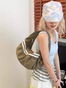 Large Capacity Canvas Bag Womens Commuter Handheld Shoulder Bag Retro American Sports Series Soft Nylon Fabric Zipper Closure