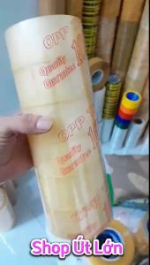 Băng keo trong đục 100yard nặng 900gram rộng 4.7cm lõi giấy 5mm. Mua từ 6 cây dc kèm dao cắt băng keo.