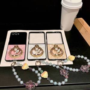 แหวนที่วางแบบโลหะแม่เหล็กแวววาว [เข้ากันได้กับ Magsafe] เคสแม่เหล็ก TPU + PC ติดเพชรกากเพชรสำหรับ Samsung Galaxy Z Flip7 Z Flip6 Z Flip5 Flip4 Flip3พร้อมสายคล้องข้อมือ