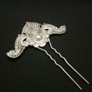 ประโยชน์:** ปิ่นปักผม ราคาถูกที่สุด (ขายปลีก-ส่ง) ปิ่นปักผมเจ้าสาว เจ้านาง ตกแต่งชุดไทย ปิ่นออกงานต่าง ๆ มีหลายแบบ พร้อมส่ง