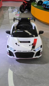 Mini Audi R8 Style Rechargeable Electric Toy Car -Sports Spoiler Leather SeatsRealistic LED LightsMP3 Player & Double Doors - Perfect Gift for Toddlers