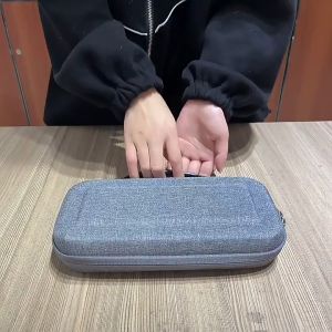 กรณียากสำหรับ Nintendo Switch กับ 19 ผู้ถือตลับเกม กรณีอุปกรณ์ป้องกันพร้อมขาตั้ง กระเป๋าเดินทางแบบพกพาสำหรับ Nintendo Switch โดย SLGOL