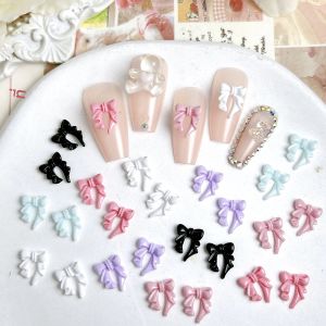 50PCS 3D Glossy Luminous Bows เรซิ่นเล็บ Charms สีทึบสั้นริบบิ้น Bowknots ตกแต่งเล็บสําหรับ DIY เล็บ