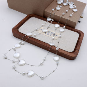 สร้อยคอไข่มุกทรงหัวใจสำหรับผู้หญิง สร้อยคอสเวตเตอร์ระดับไฮเอนด์หลายชั้น สร้อยคอแบบห้อยต่างๆ สร้อยคอแบบโซ่กระดูกงู