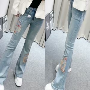 กางเกงยีนส์ทรงขาบานเอวสูงสำหรับผู้หญิง ปักลายสไตล์จีนใหม่ กางเกงยีนส์ทรงขาบานทรงยาวทรงตรงสำหรับผู้หญิง