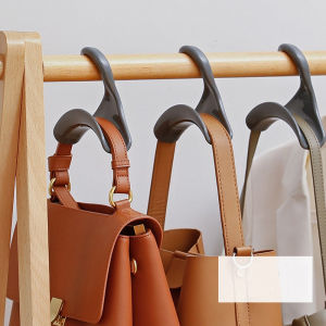 กระเป๋าทรงโค้งไม้แขวนสำหรับตู้เสื้อผ้าปากกว้างสายเข็มขัดกันรอยย่นแบบเรียบง่ายราวแขวนหมวก Syal Sutra