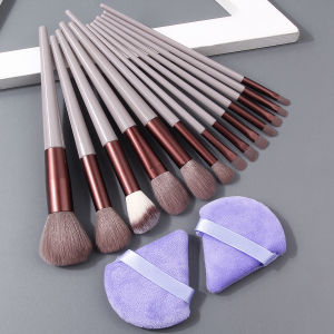 A 13-piece makeup brush set includes loose powder blush brush eyeshadow brush contouring brush and +2 sponge powder puffs