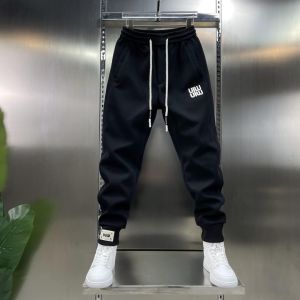 กางเกงวอร์มสปอร์ตชายทรงสลิมฟิตเอวยางยืดผ้าฝ้ายลายปักสไตล์ฮาราจูกุ ทรงหลวม กางเกงขายาวทรงสลิมฟิตสำหรับใส่ลำลองในฤดูหนาว