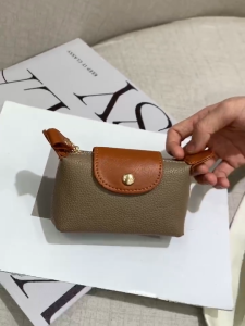 Genuine Leather Compact Coin Purse Women′s Soft Leather Mini Storage Bag First Layer Cowhide Hand Coin Purse