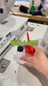 Bình vòi sắt có sẵn dầu máy may