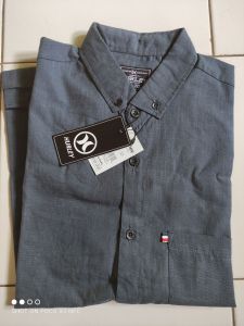 kemeja pria polos lengan pendek ukuran M L XL
