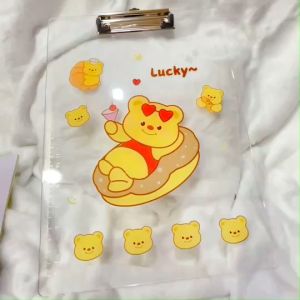 ✍️ เขียนงานได้ลื่นปรื๊ด! กับแผ่นรองเขียนสุดคูล เนื้อสัมผัสดี๊ดี อัพเกรดโต๊ะทำงานของคุณให้ดูทันสมัย แผ่นรองเขียนใส ลายการ์ตูน A4 ขนาด 23x32 cm. ( สินค้าหยิบคละลาย )