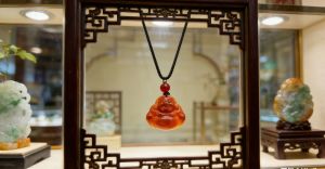 jadeiete pendant yellow n red colour in laughing buddha+free Black" obsidian hulu" (gourd ")