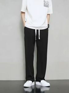 Celana panjang lurus pinggang tinggi pria versi Korea celana panjang longgar kasual warna solid Celana panjang sutra es tipis musim panas Celana panjang kaki lebar yang modis celana joger premium pria celana training olahraga keren