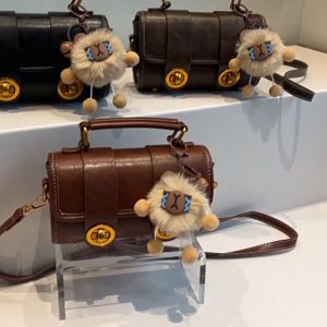 Túi xách nữ siêu đẹp túi xách tay đeo chéo thiết kế da nhăn 2 dải tặng kèm móc gấu xinh xắn Thanhthushop68 959
