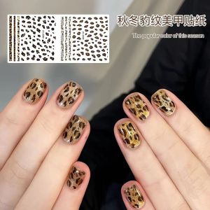 อินเทรนด์ สติ๊กเกอร์ติดเล็บพิมพ์ลายเสือดาว ฤดูใบไม้ร่วง ฤดูหนาว แฟชั่นกราฟฟิตีส่วนบุคคลสไตล์ใหม่พร้อมกาวดอกไม้เล็บด้านหลัง