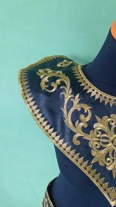 renda bordir kostum tari motif cemara